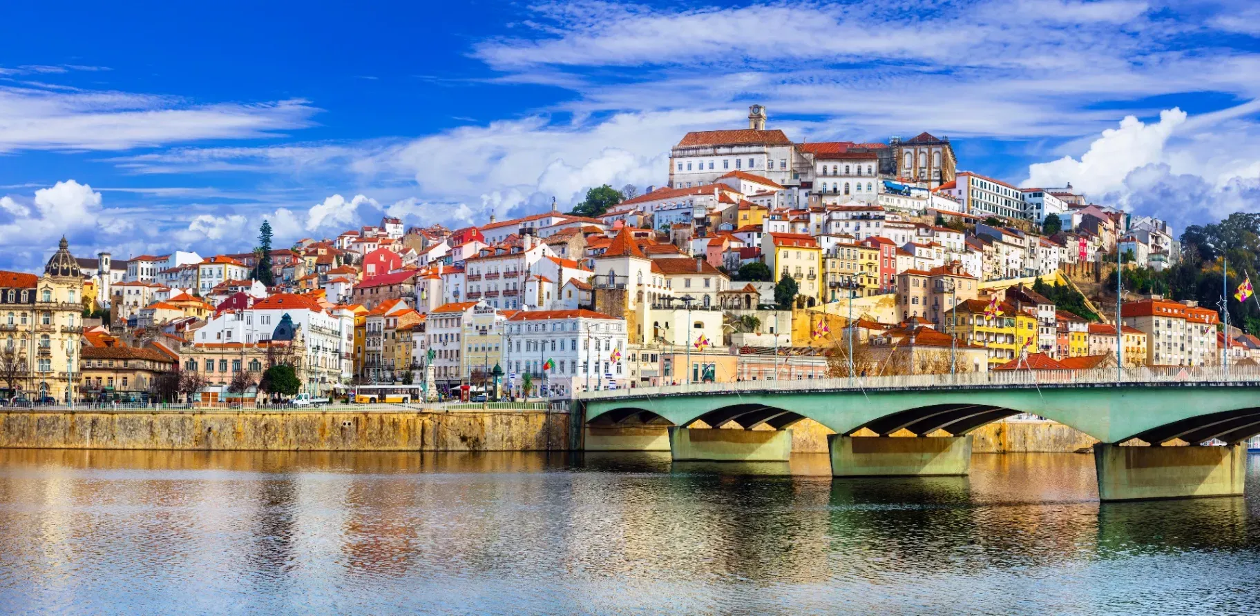 Panoramic overview of Coimbra city with the old town on the hill