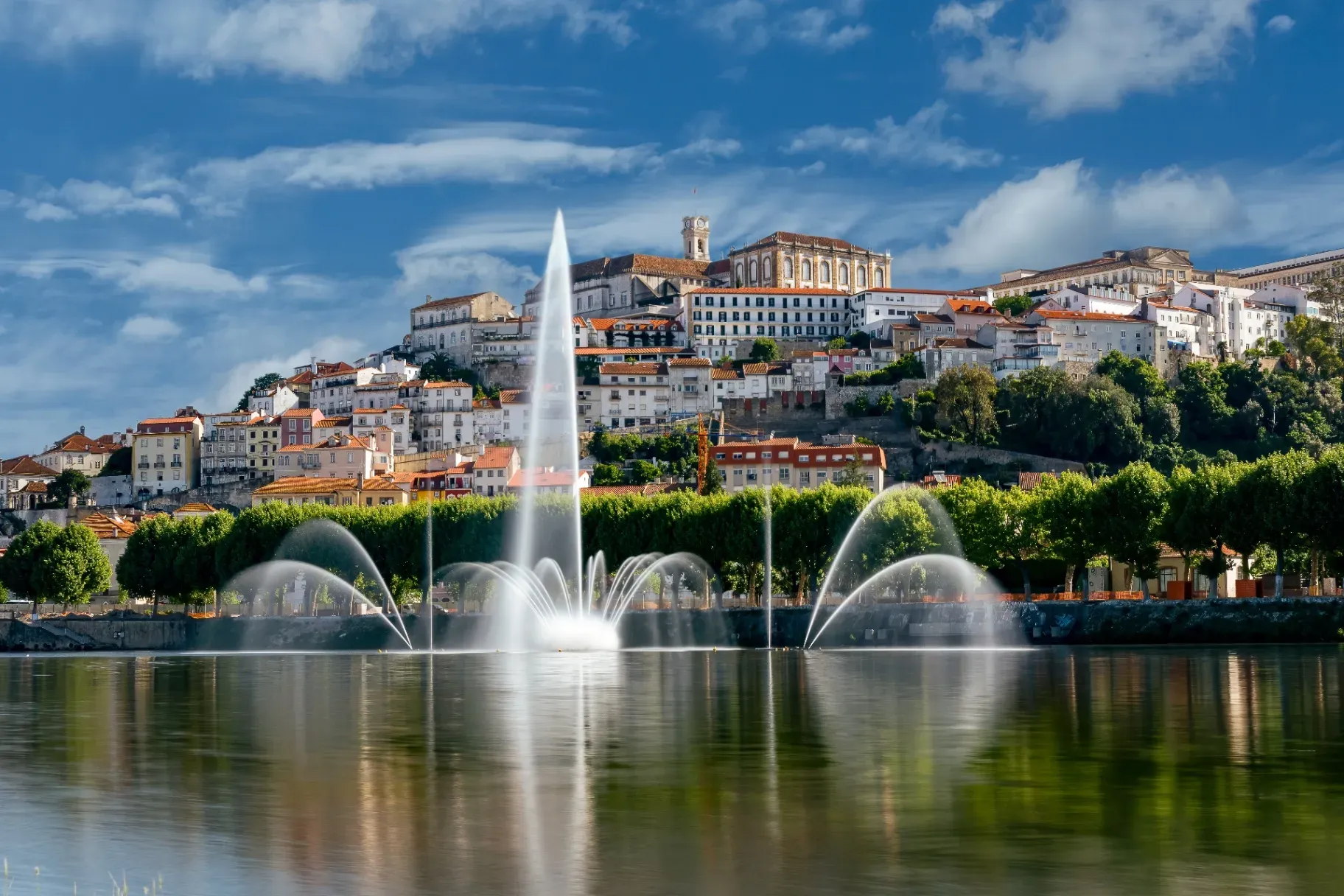 View of Coimbra and the University hill from the Mondego River