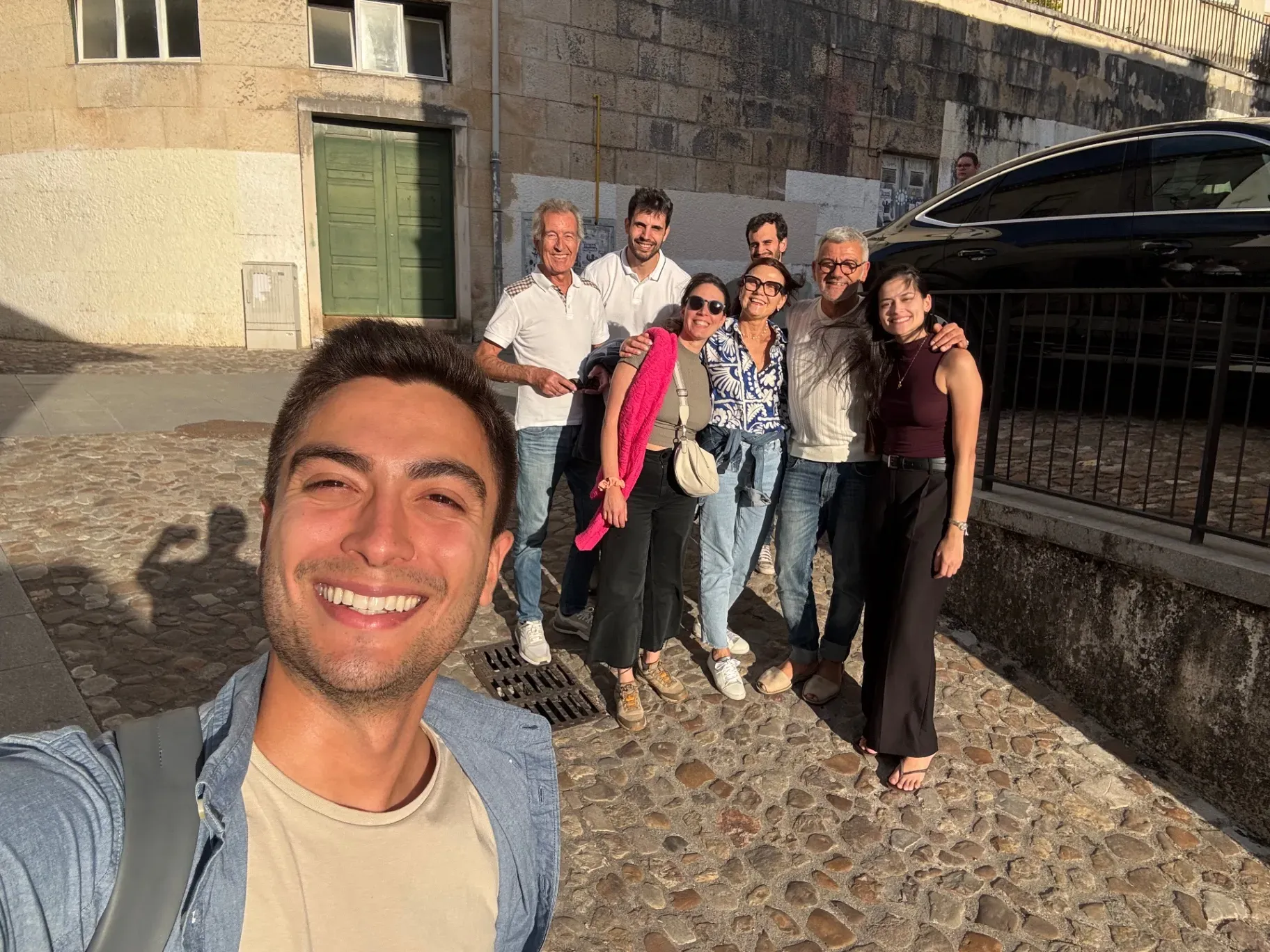 Local host Mateus with tourists on a private walking tour in Coimbra