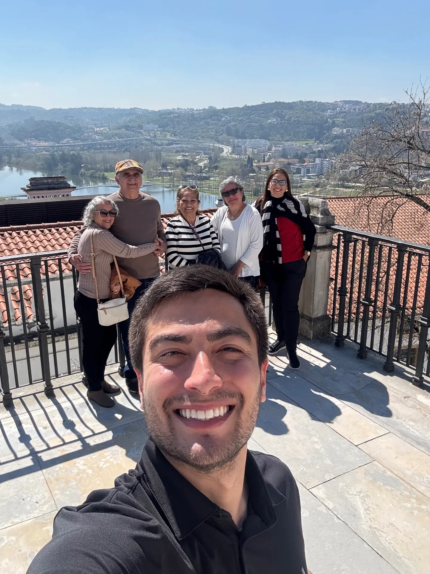 Private tour group with Mateus at a scenic viewpoint in Coimbra